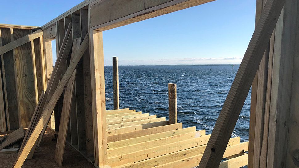 A stilt house that was destroyed in a fire two months ago is being rebuilt. (Tim Wronka/Spectrum Bay News 9)