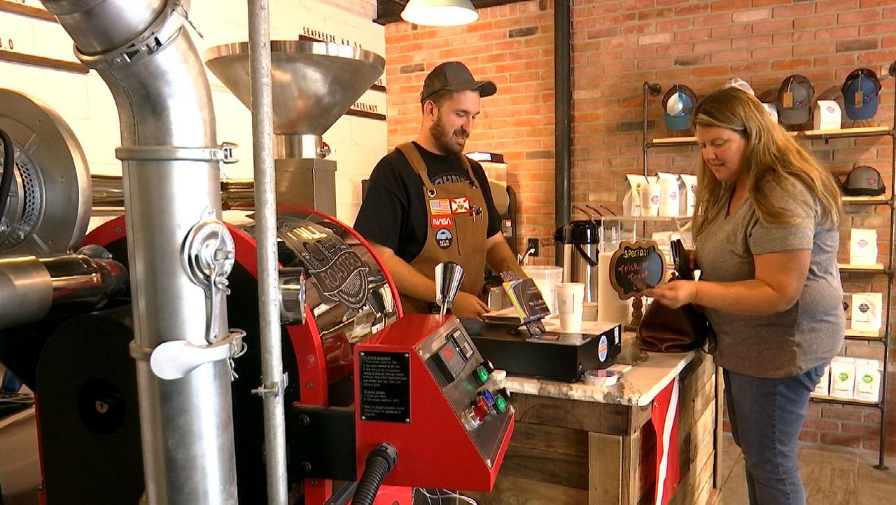 Justin Hilligoss recently opened up Pier 13 Coffee Company in downtown Titusville. (Krystel Knowles/Spectrum News 13)