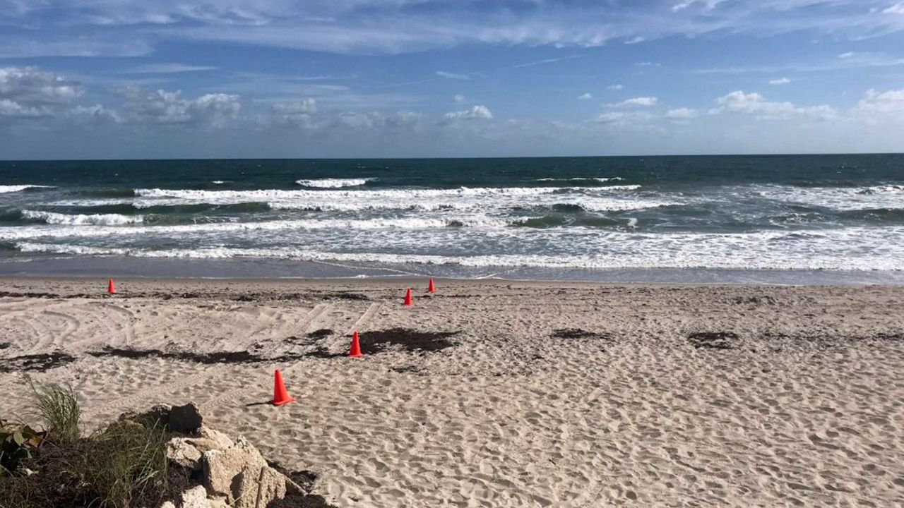 The coughing and wheezing from beachgoers continued nearly a week after red tide was first felt on the Space Coast. (Greg Pallone/Spectrum News 13)