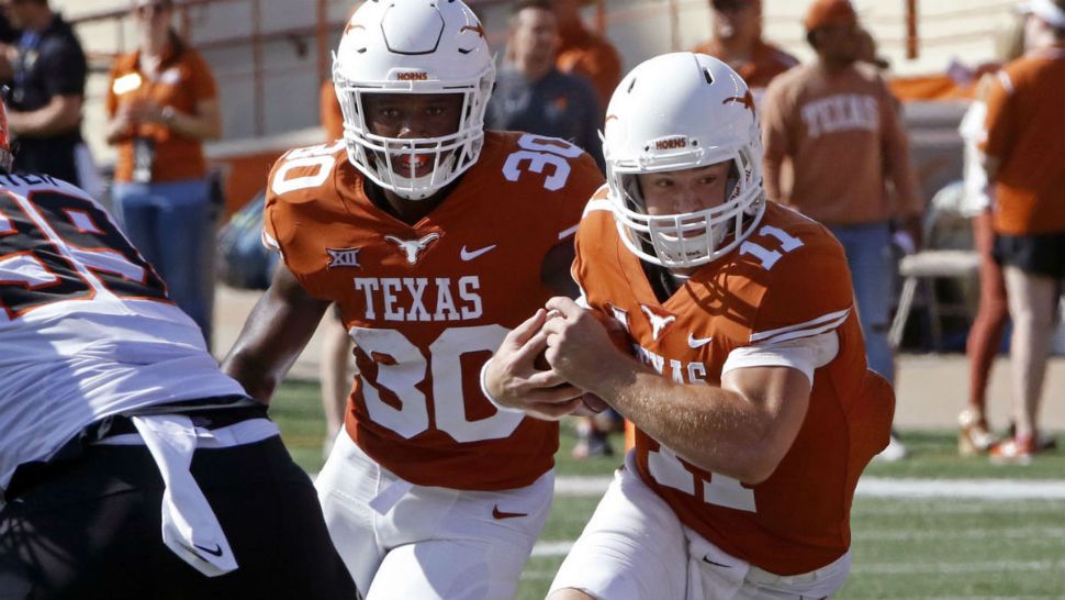 Photo of players in a UT game (Spectrum News)
