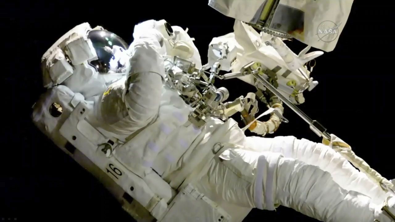 In this image from video made available by NASA, astronaut Joe Acaba performs a spacewalk outside the International Space Station on Friday, Oct. 20, 2017. (NASA via AP)