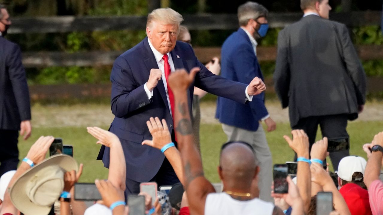 President Donald Trump dances as he leaves a campaign rally Friday, October 23, 2020, in The Villages, Florida, one of the largest retirement communities in the country. (John Raoux/AP)