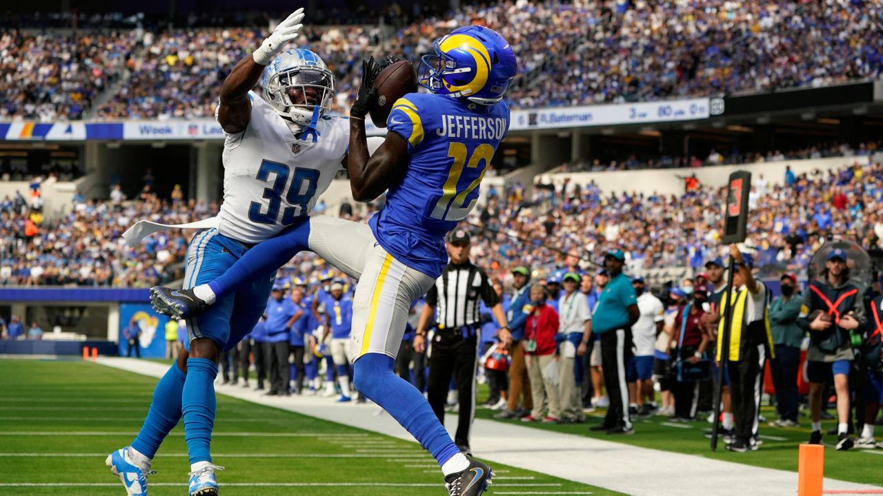 Los Angeles Rams wide receiver Van Jefferson, right, hauls in a touchdown pass in the end zone as Detroit Lions cornerback Jerry Jacobs defends during the first half of an NFL football game Sunday, Oct. 24, 2021, in Inglewood, Calif. (AP Photo/Marcio Jose Sanchez)