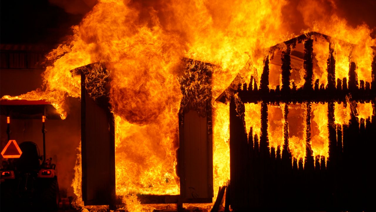 Shed and tractor on fire