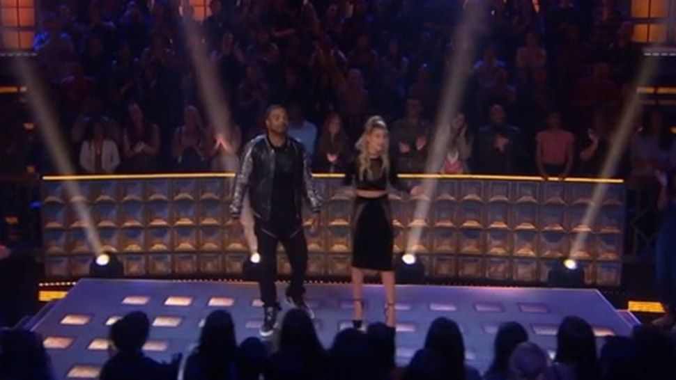 Method Man and Hailey Baldwin host "Drop the Mic" a competition show where celebrities face-off in rap battles. (TBS)