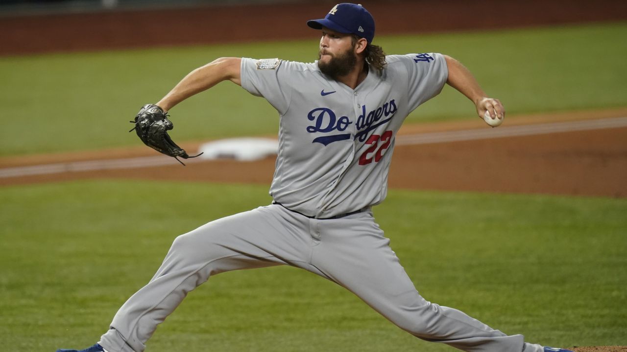 Los Angeles Dodgers starting pitcher Clayton Kershaw throws against the Tampa Bay Rays during the first inning in Game 5 of the World Series Sunday, Oct. 25, 2020, in Arlington, Texas. (AP Photo/Eric Gay)