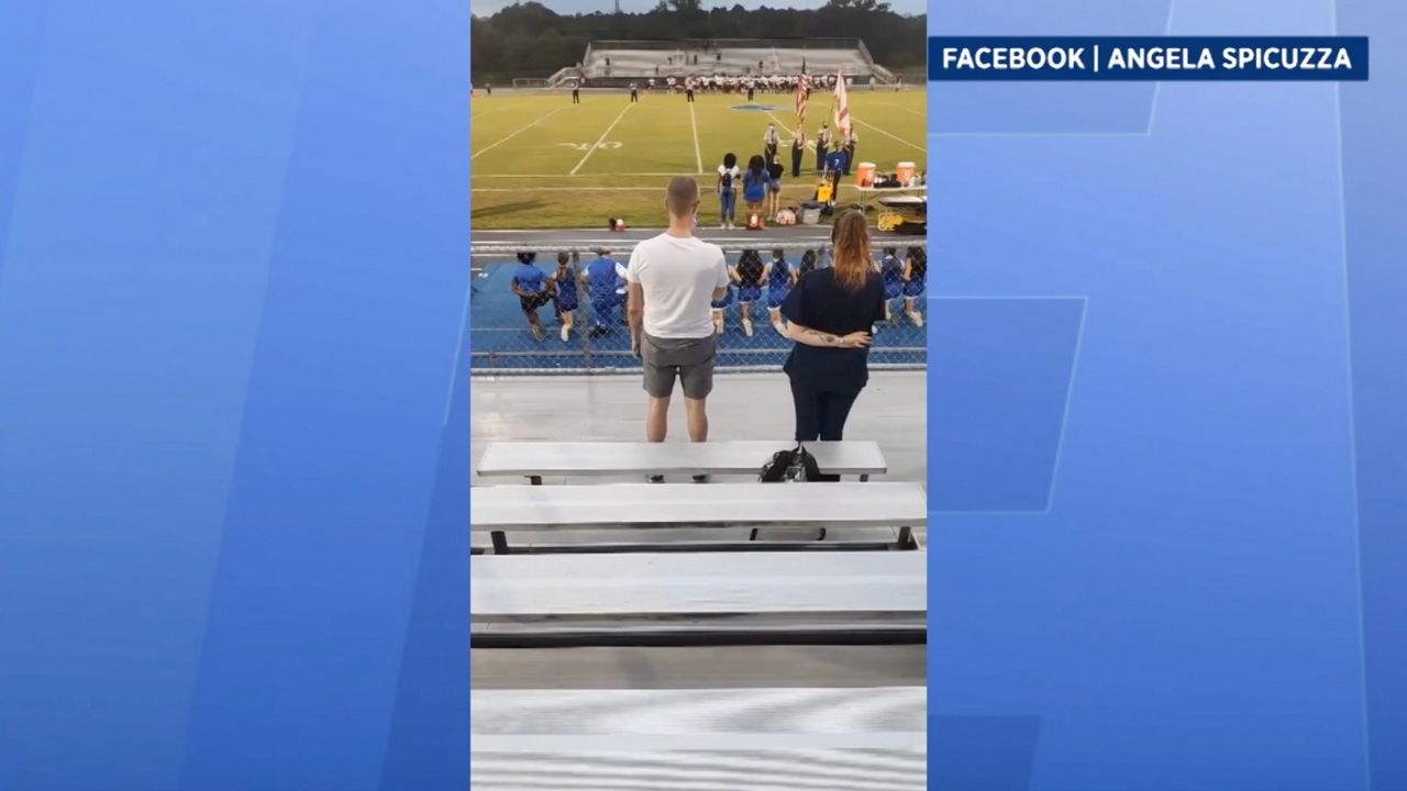 Was Cheerleader Forced To Kneel During National Anthem 