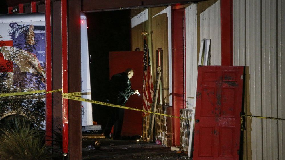Officials work a crime scene after a shooting at Party Venue on Highway 380 in Greenville, Texas, on Sunday, October 27, 2019. (Ryan Michalesko/The Dallas Morning News via AP)