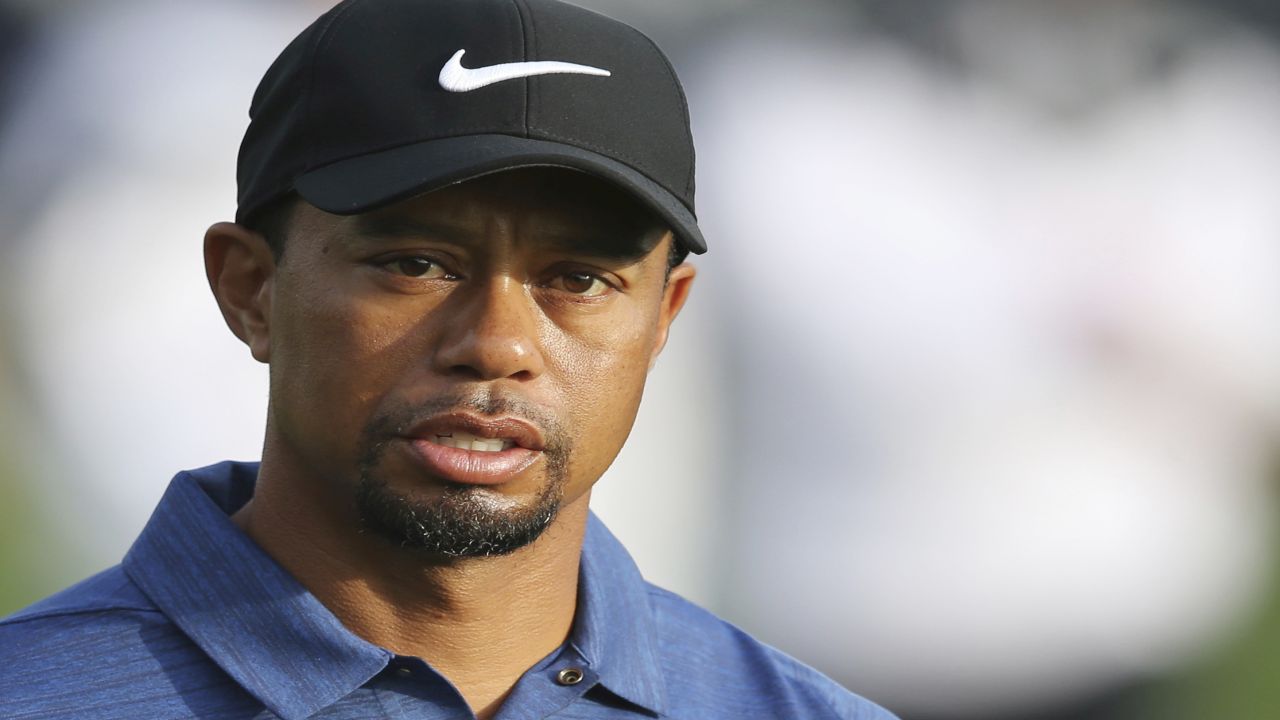 In this Feb. 2, 2017, file photo, Tiger Woods reacts on the 10th hole during the first round of the Dubai Desert Classic golf tournament in Dubai, United Arab Emirates. The diversion program for intoxicated drivers that Woods is expected to enter Friday, Oct. 27, is one of several across the U.S. aimed at reducing the number of repeat offenders and backlogs of court cases. (AP Photo/Kamran Jebreili, File)