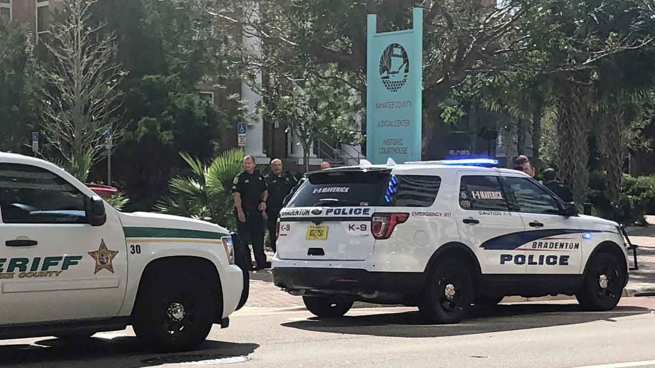 Manatee Co. Sheriff's Office, Bradenton Police outside the Manatee County Judicial Center and Historic Courthouse on Monday, Oct. 28, 2019. The buildings were evacuated following an anonymous bomb threat. (Mark Gambino/Spectrum Bay News 9)