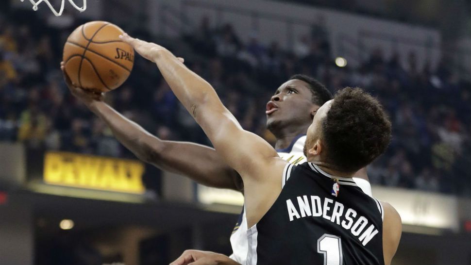Indiana Pacers' Victor Oladipo puts up a shot shot against San Antonio Spurs' Kyle Anderson (1) during the first half of an NBA basketball game, Sunday, Oct. 29, 2017, in Indianapolis. (AP Photo/Darron Cummings)