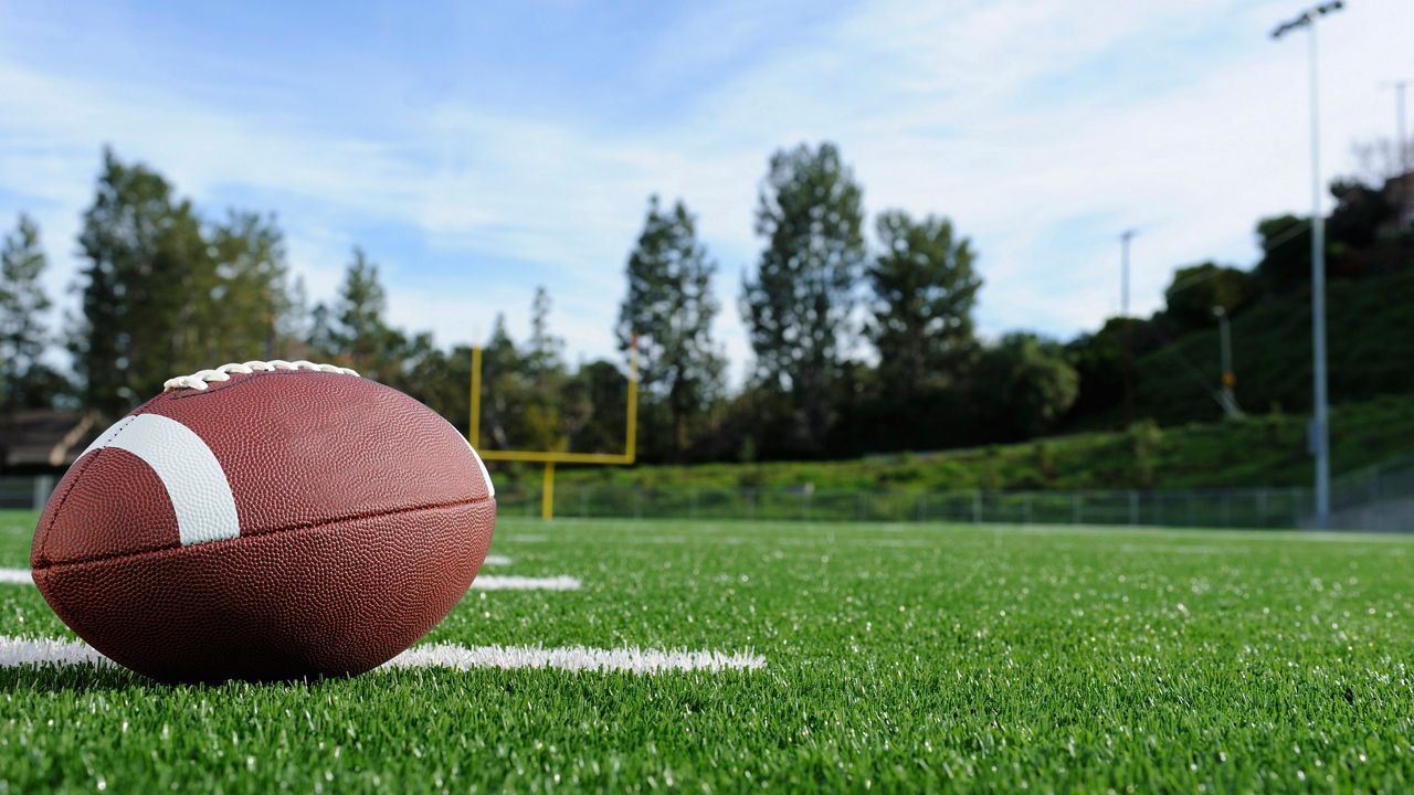 A football on a field (Getty Images)