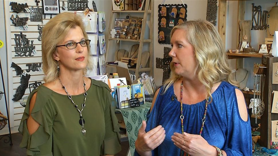 L to R: Michelle Johnson and Delta Ryan, the owner of "Take Heart" in downtown Lakeland, quit their full-time jobs in order to devote their time and energies to helping impoverished communities through their store. (Rick Elmhorst, staff)