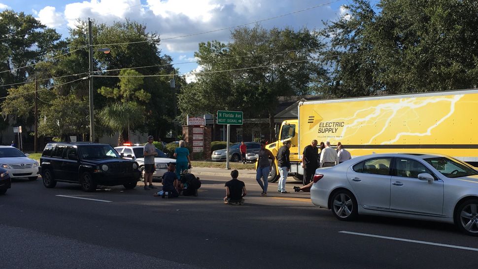 Two children were struck while trying to cross a busy intersection Tuesday afternoon in Tampa. The children weren't in a crosswalk, and the driver wasn't charged, police say. (Laurie Davison/Spectrum Bay News 9)