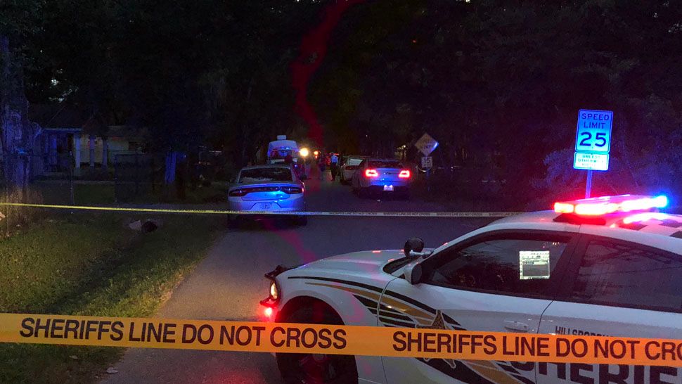 Deputies outside house on 32nd Avenue South where a body was found Thursday evening. (Trevor Pettiford/Spectrum Bay News 9)