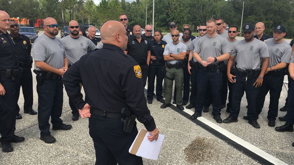Members of the “Tampa Strong Platoon” were welcomed back by fellow officers Thursday following their deployment to the panhandle to help with Hurricane Michael relief. (Sarah Blazonis/Spectrum Bay News 9)