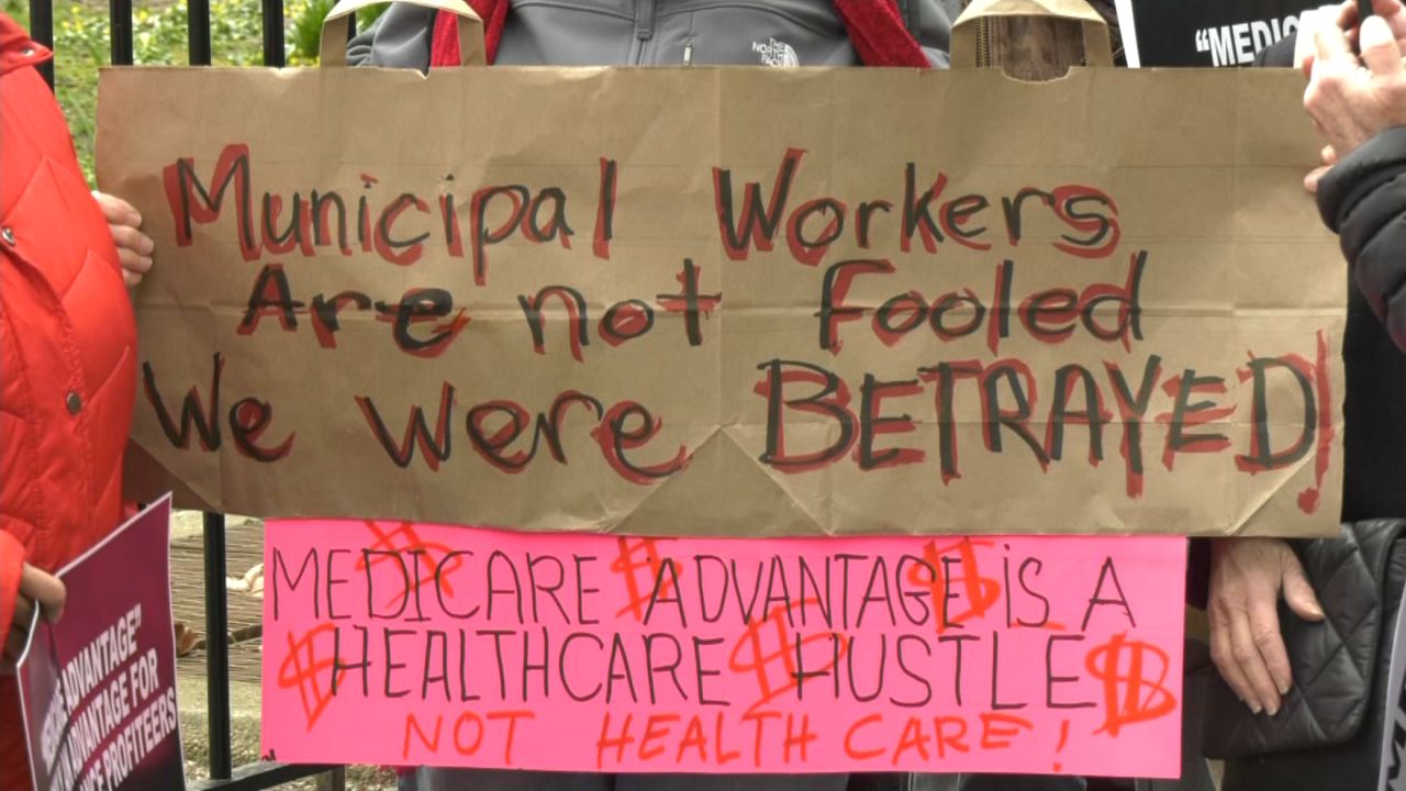 Retired city workers protest new privatized healthcare plan