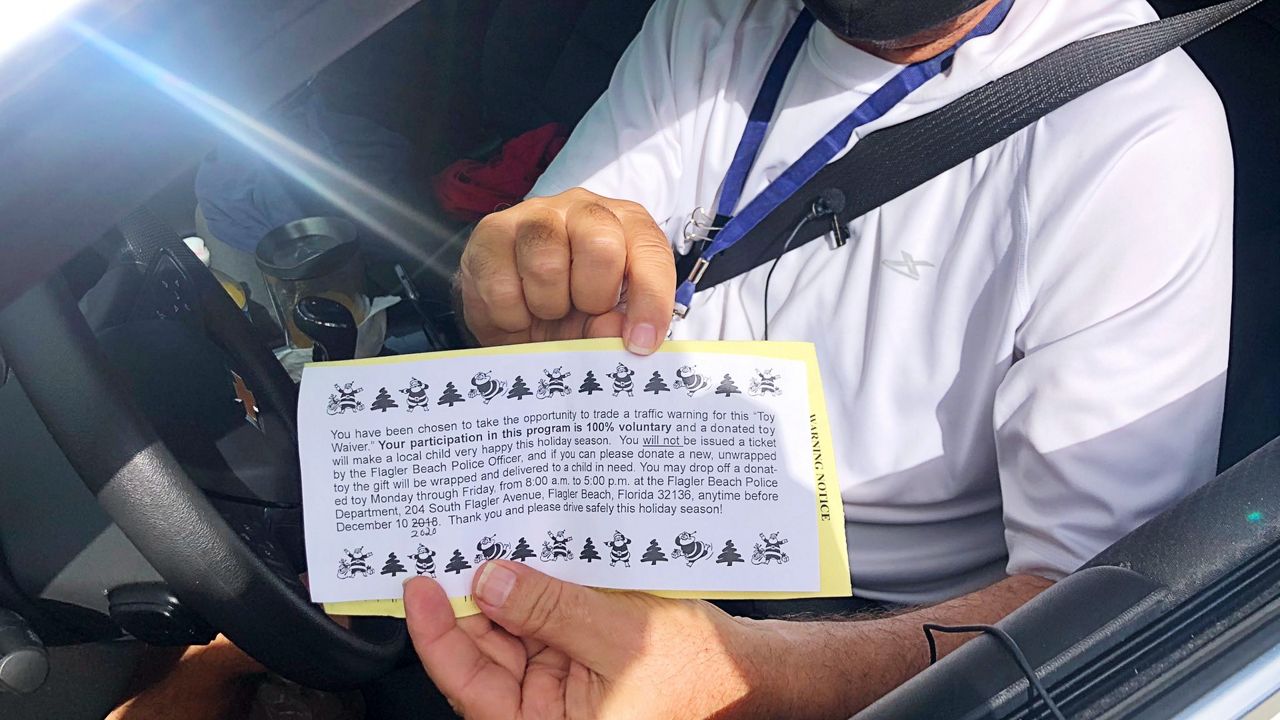 Officers can use their discretion to issue a warning for minor traffic violations and a "toy waiver" instead of a ticket. (Nicole Griffin/Spectrum News 13)