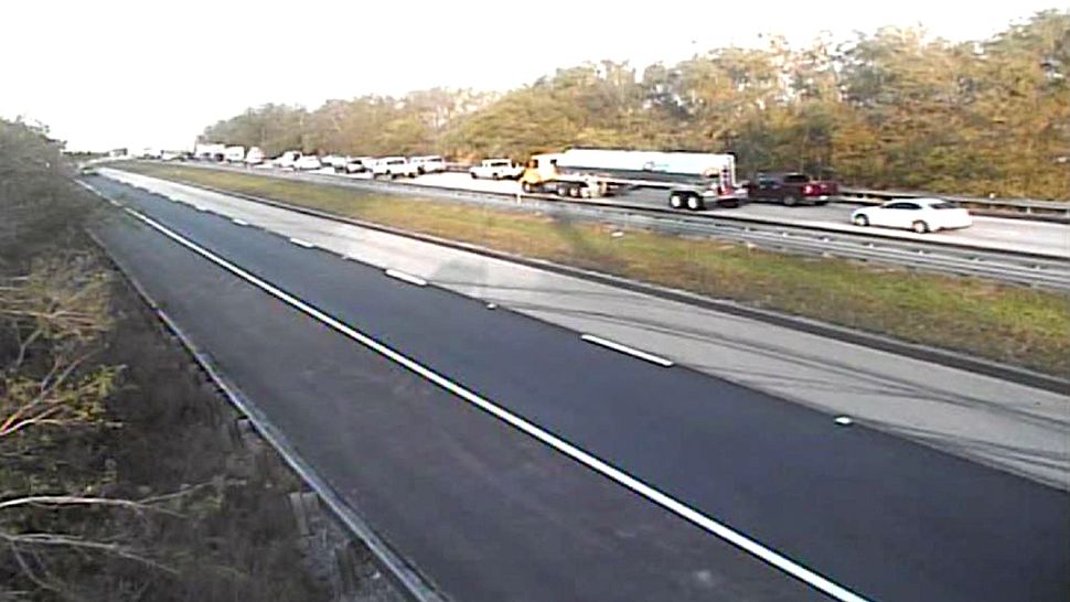 Traffic was severely backed up on westbound State Road 528 on Monday morning after a semi struck a semi driver standing on the side of the road, troopers say. (Florida Department of Transportation)