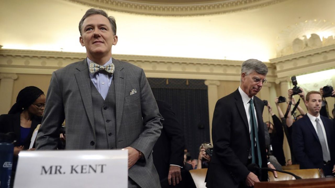 George Kent (left) and William Taylor arrive to testify before the House Intelligence Committee on Capitol Hill in Washington on Wednesday during the first public impeachment hearing of President Donald Trump's efforts to tie U.S. aid for Ukraine to investigations of his political opponents. (Andrew Harnik/AP)