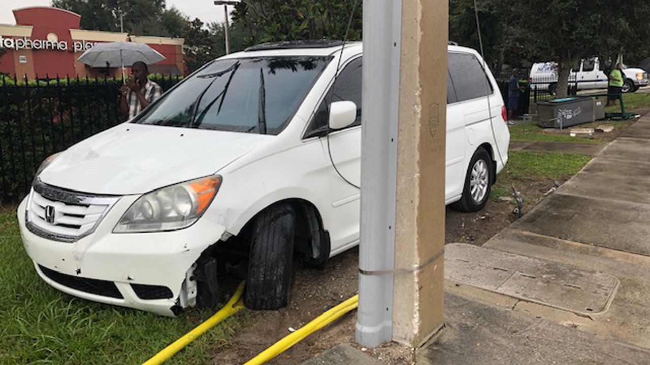 Three people, including a child, were injured after a mini-van crashed into a Lynx bus stop on Silver Star Road in Orlando on Friday, Nov. 15, 2019. (Jeff Allen/Spectrum News 13)