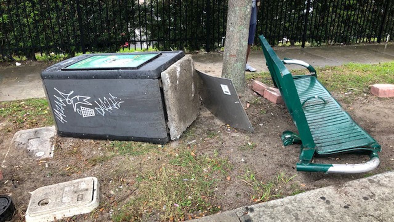 Three people, including a child, were injured after a mini-van crashed into a Lynx bus stop on Silver Star Road in Orlando on Friday, Nov. 15, 2019. A bench can be seen on the ground. (Jeff Allen/Spectrum News 13)