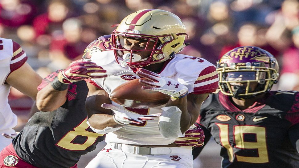 Boston College wide receiver Kobay White is tackled by Florida State defensive back Stanford Samuels III in the first half of FSU's comeback win over the Eagles.  (AP Photo/Mark Wallheiser)