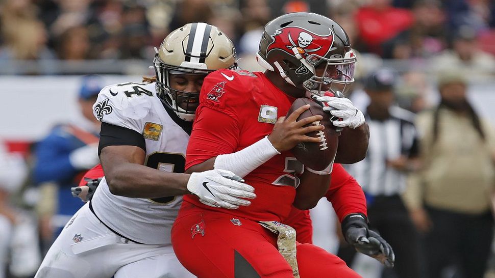 Tampa Bay Buccaneers quarterback Jameis Winston is sacked by New Orleans defensive end Cameron Jordan during the second half of the Bucs' 34-17 loss to the Saints.  (AP Photo/Mark LoMoglio)