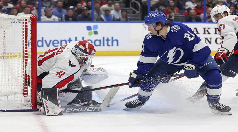 Washington Capitals goaltender Vitek Vanecek, of Czech Republic, makes a save against Tampa Bay Lightning's Brayden Point during the second period of an NHL hockey game Monday, Nov. 1, 2021, in Tampa, Fla. (AP Photo/Mike Carlson)