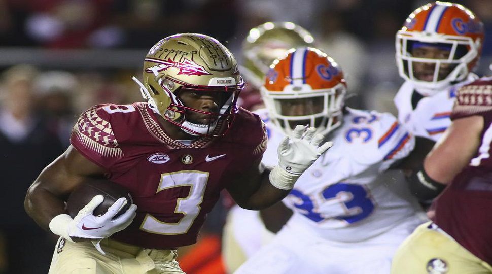 Florida State running back Trey Benson (3) runs for a touchdown in the first quarter of an NCAA college football game against Florida, Friday, Nov. 25, 2022, in Tallahassee, Fla. (AP Photo/Phil Sears)