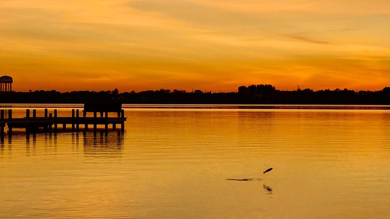 Sent to us with the Spectrum News 13 app: It was a lovely sunset as a fish jumped out of the Indian River Lagoon for a brief moment on Tuesday, Nov. 27, 2019. (Photo courtesy of Lau Brown, viewer)