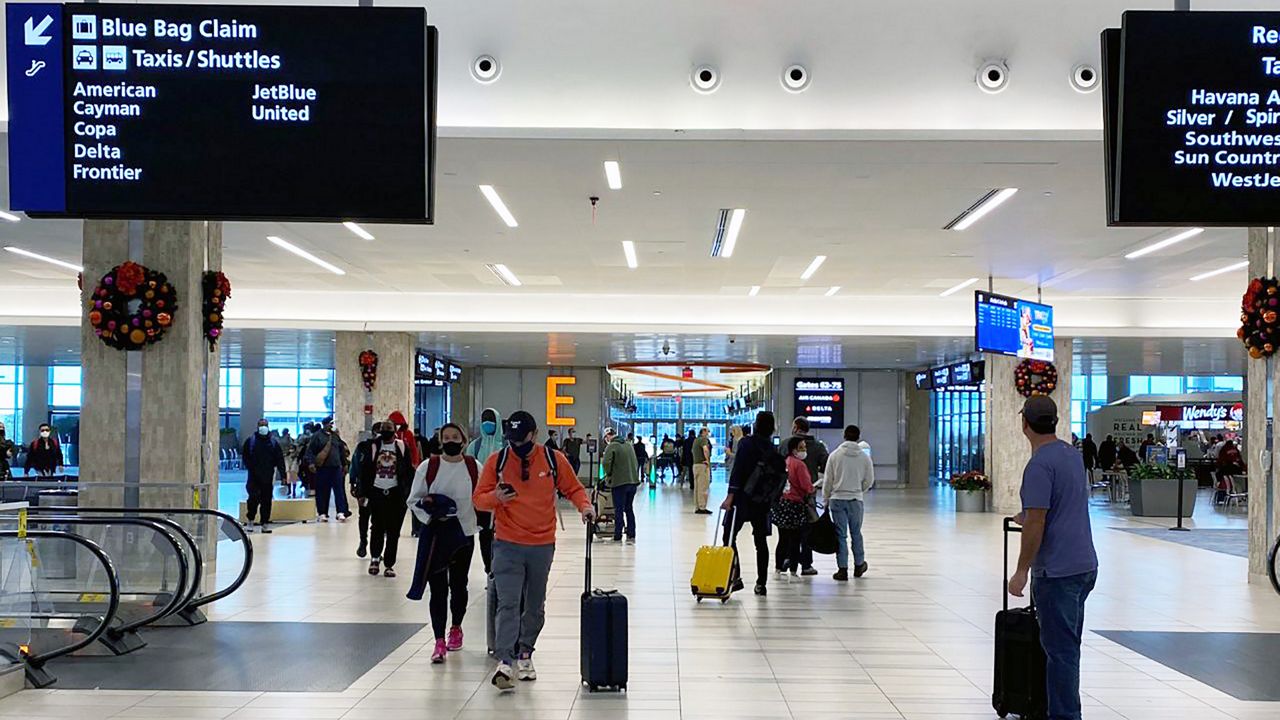 Airline passengers arrive early so they don't miss flight