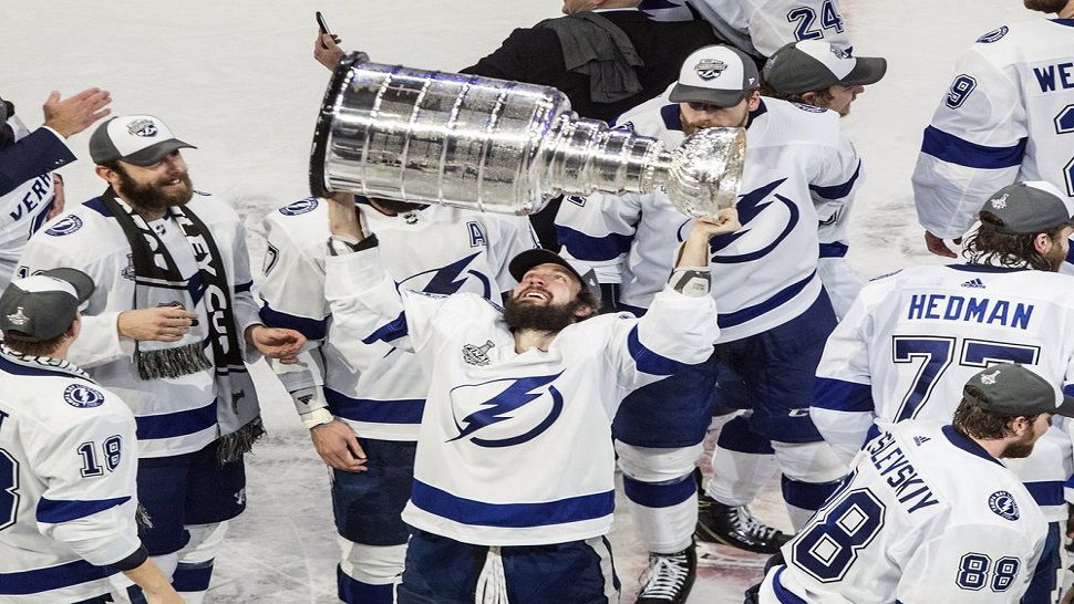 In this Sept. 28, 2020 file photo, Tampa Bay Lightning forward Nikita Kucherov (86) hoists the Stanley Cup after defeating the Dallas Stars in the NHL's Stanley Cup Final in Edmonton, Alberta.  (Jason Franson/The Canadian Press via AP, File)