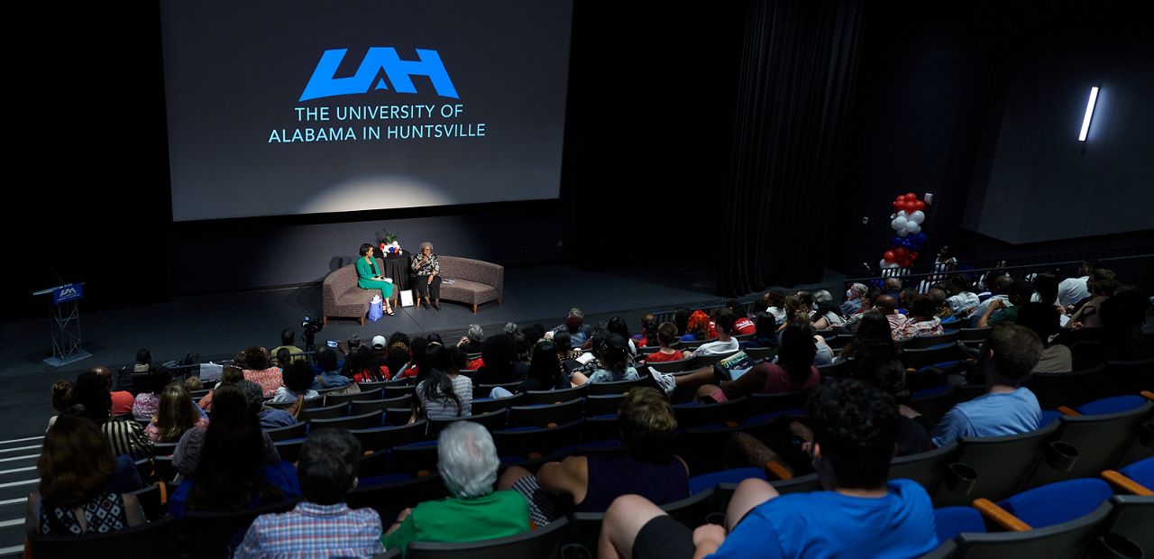 Opal Lee participated in a public dialogue hosted by the University of Alabama in Huntsville on August 29,, 2002. During a conversation she pledged to help the woman known as Mama Uganda with housing. (Credit, James D. Teed)