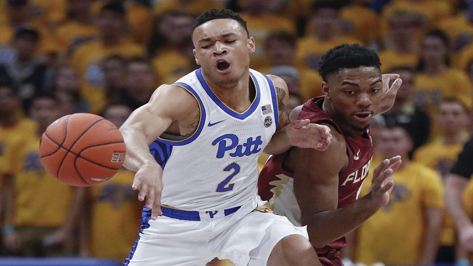 Pittsburgh's Trey McGowens (2) and Florida State's Anthony Polite, right, battle for a loose ball during the season-opening game.  (AP Photo/Keith Srakocic)
