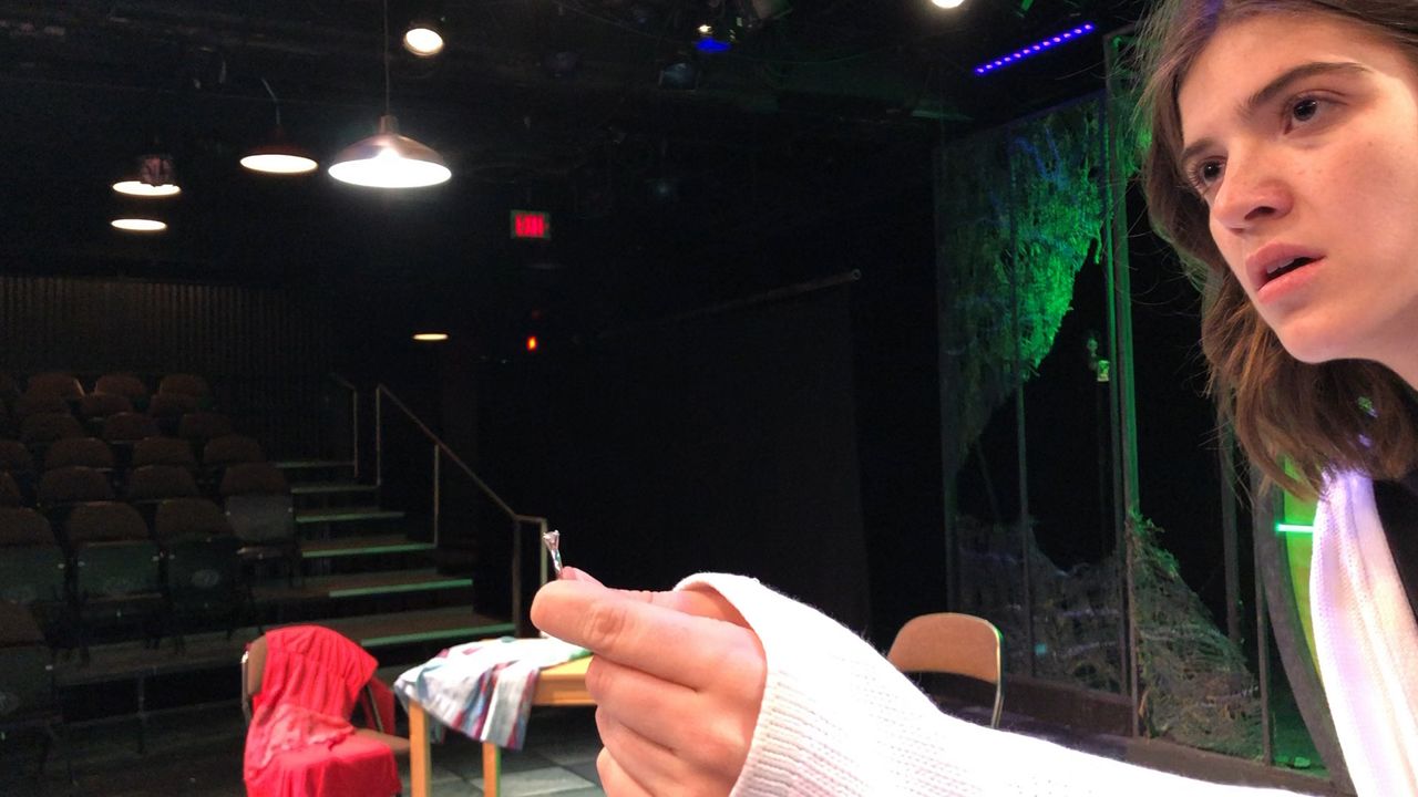 student in theatre production