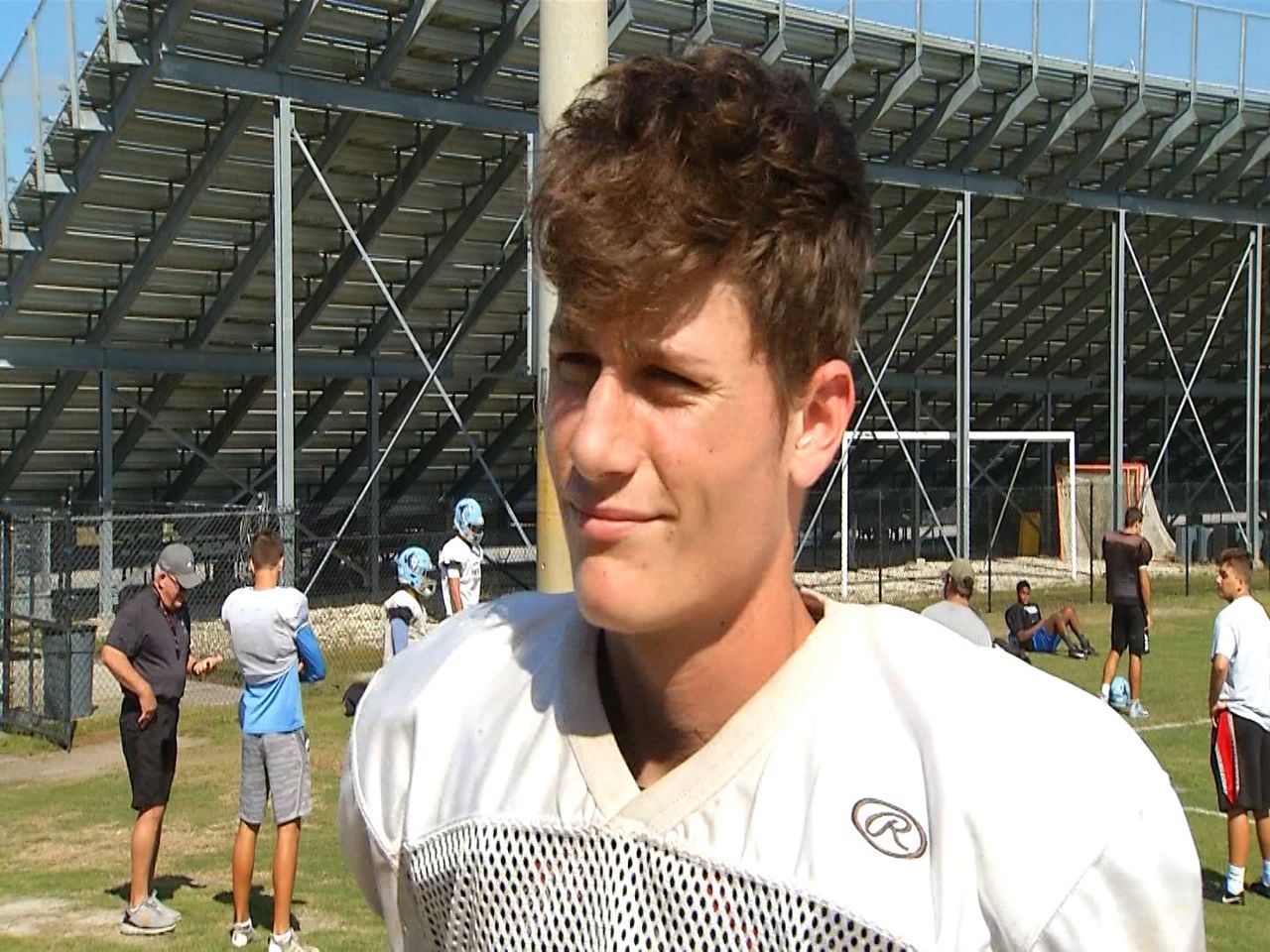 Hagerty senior Ian Watts leads Huskies past Edgewater to secure district title and playoff berth. 