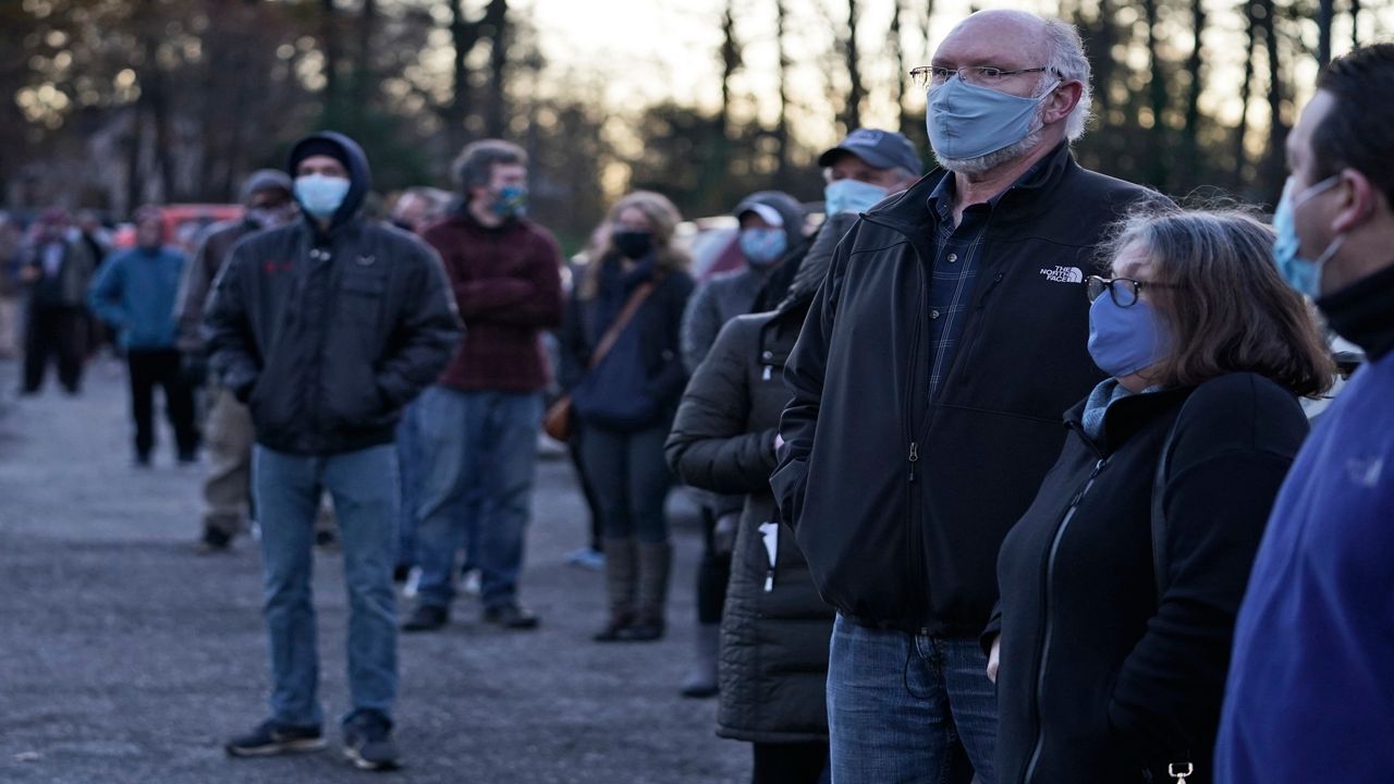 Gov. DeWine said he'll end health orders, like the mask mandate, once Ohio dips below 50 cases per 100,000 people for two weeks straight. (AP Photo)