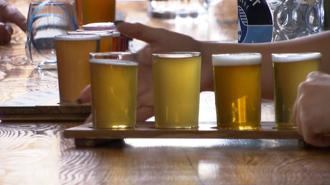 glasses of beer on a bar