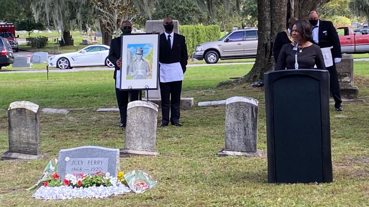 U.S. Rep. Val Demings speaks during a Masonic rites ceremony for July Perry at Orlando's Greenwood Cemetery on Saturday. Perry was lynched by a mob in Ocoee after trying to vote 100 years ago. (Pete Reinwald/Spectrum News 13)