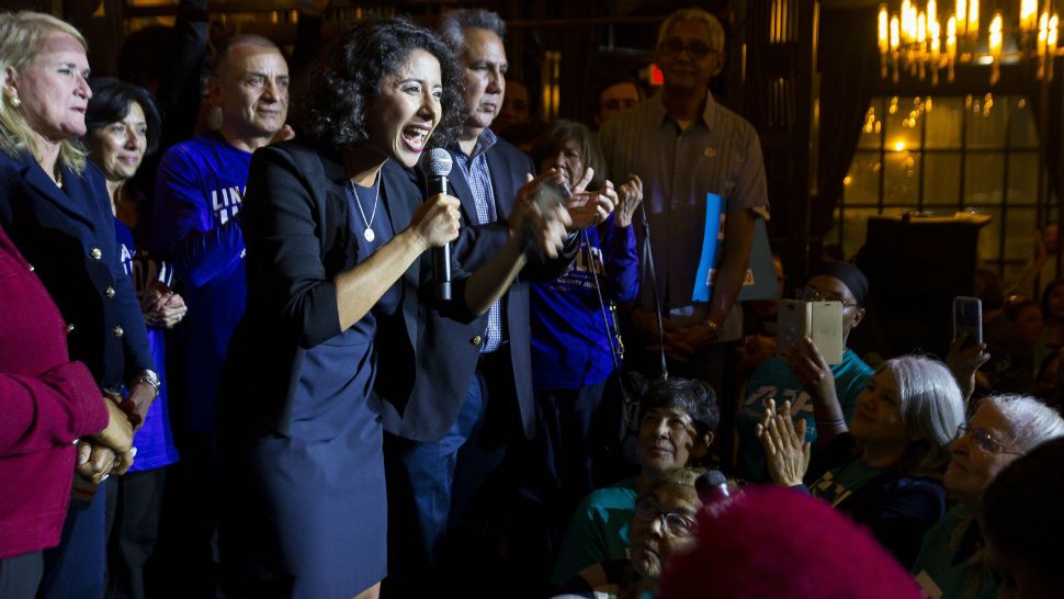 Democrat candidate for Harris County Judge, Lina Hidalgo, talks with campaign volunteers outside of a polling place located at the SPJST Lodge 88 in the Heights, Tuesday, Nov. 6, 2018 in Houston. Unofficial election results show Republican Emmett was defeated Tuesday by Democrat Linda Hidalgo in her first race for public office. (Mark Mulligan/Houston Chronicle via AP)