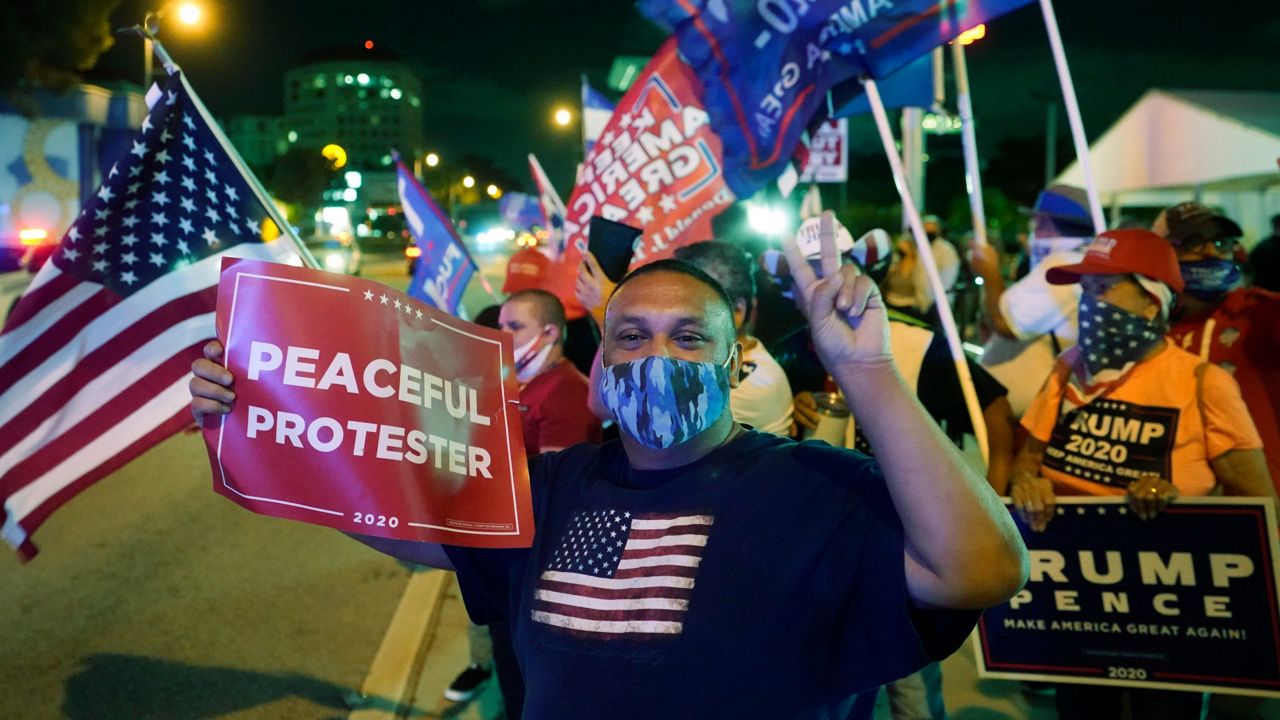 Latinos show support for President Trump in Miami-Dade County. (AP/File)