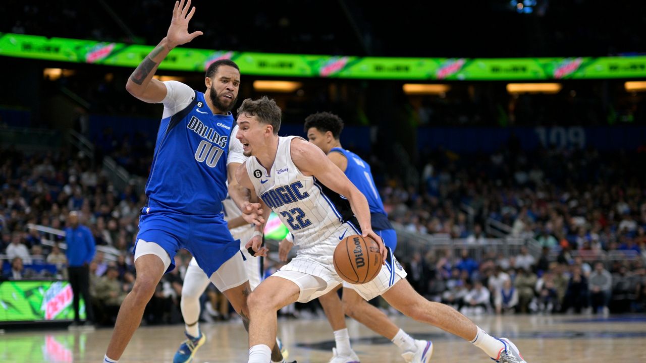 Dallas Mavericks forward Tim Hardaway Jr. (11) dribbles as Orlando