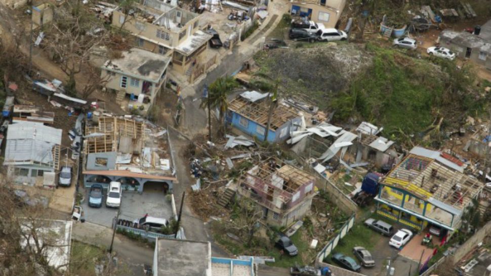 Hurricane Maria ripped roofs off homes in Puerto Rico, as seen in this image from Sept. 30, 2017. (Yuisa Rios, FEMA)
