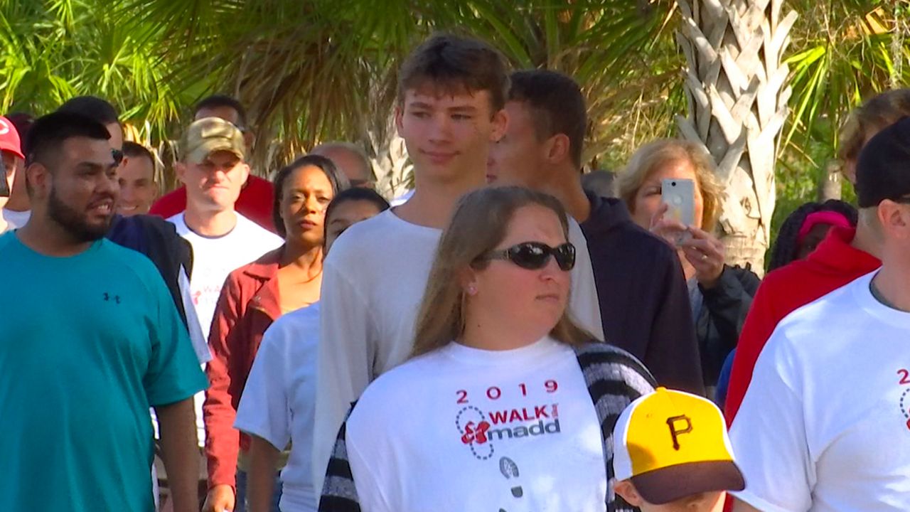 On Saturday, the organization Mothers Against Drunk Driving (MADD) and the Manatee County Sheriff’s Office came together for their 4th annual walk. (Gabrielle Arzola/Spectrum News)