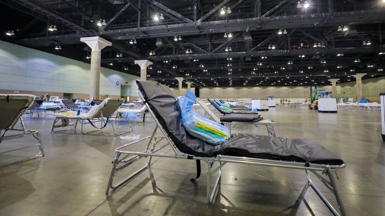 Cots are set up as a medical station to help relieve nearby hospitals as they fight COVID-19, at the Los Angeles Convention center in downtown Los Angeles on March 29, 2020. (Office of Mayor Eric Garcetti via AP)
