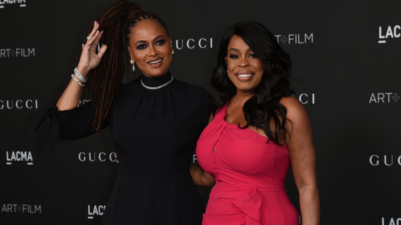 Ava DuVernay, left, and Niecy Nash arrive at the LACMA Art + Film Gala on Saturday, Nov. 6, 2021, at the Los Angeles County Museum of Art in Los Angeles. (Photo by Richard Shotwell/Invision/AP)
