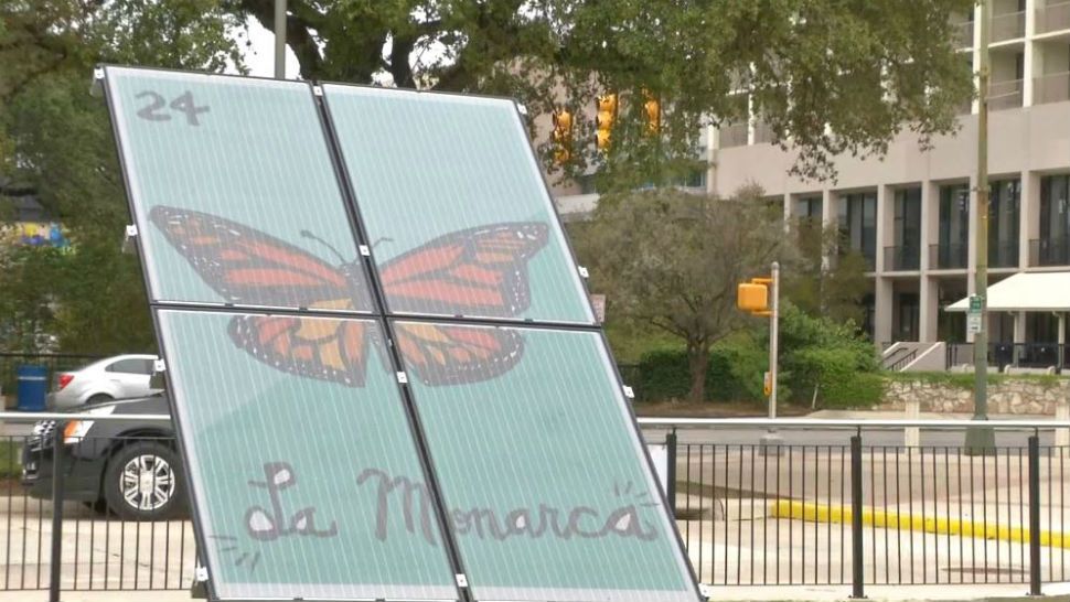 A solar panel mural with a monarch butterfly