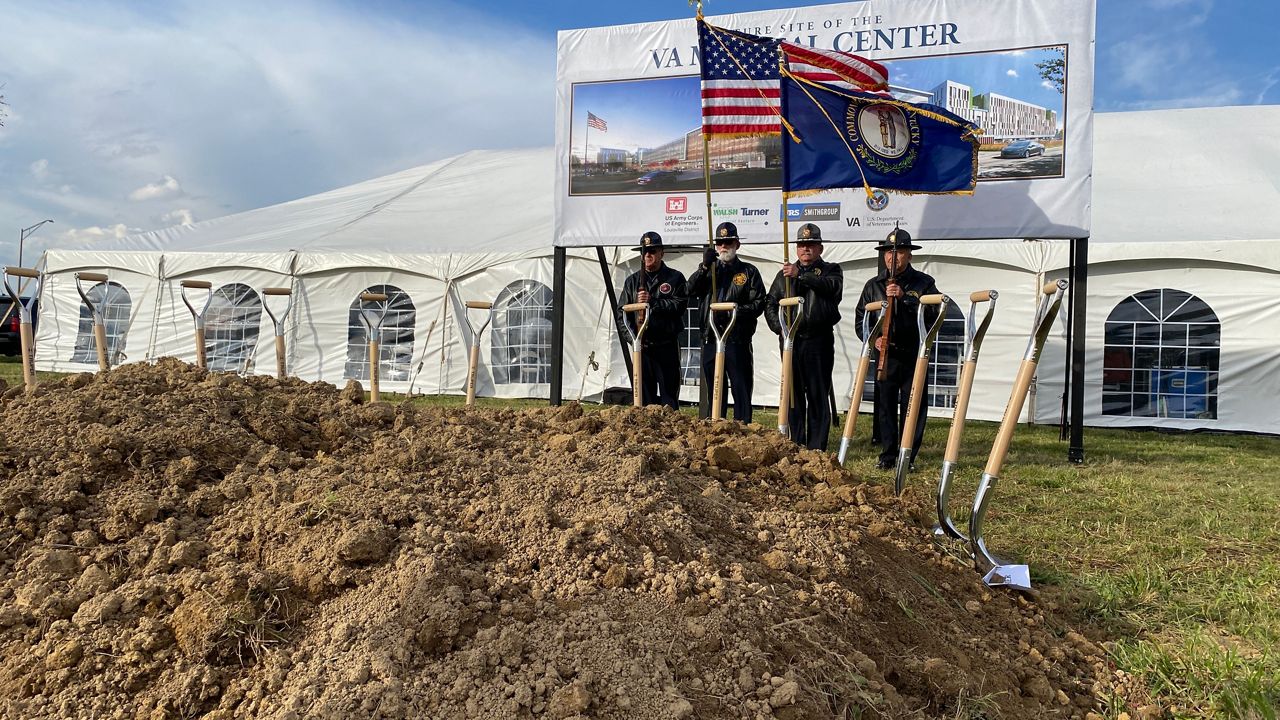 Officials break ground at the location of Louisville's new VA Medical Center on Nov. 11, 2021 (Spectrum News 1/Erin Wilson)