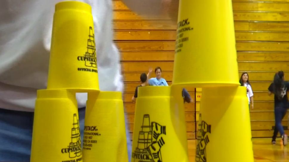 Woman Uses Cup-Stacking With Kids to Honor Late Brother